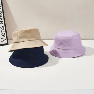 Outdoor sun protection bucket hats in khaki, navy, and purple colors for women and men