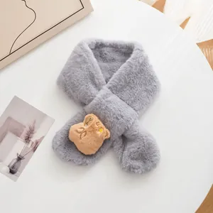 Close-up of a plush grey faux fur kids scarf featuring a cute brown cartoon bear mascot