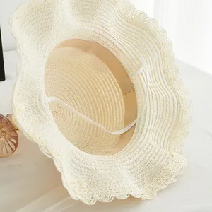 Close-up of summer sun hat with sweatband, windproof rope and wavy edge detail