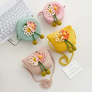 Straw-woven crossbody bags for girls with 3D floral accents in vibrant colors