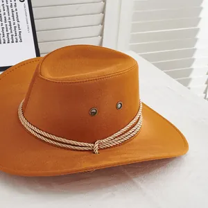 Macro detail of ginger wool felt cowboy hat featuring breathable metal eyelets and rope