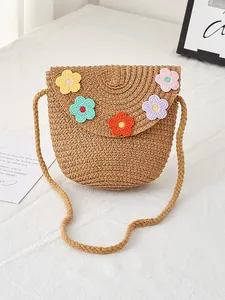 Handmade straw crossbody bag for girls with colorful crochet flowers and flip cover