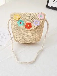 Handmade straw woven shoulder bag for girls with colorful crochet flowers and long strap