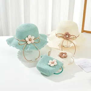Kids woven straw sun hat and matching crossbody bag set with floral accents for summer