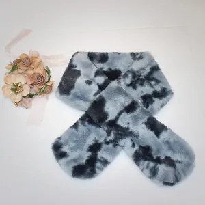 Detail of plush faux rabbit fur scarf featuring black and grey tie-dye marble texture