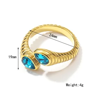 Bague rétro en acier inoxydable plaqué or 18 carats avec deux zircons bleus en goutte