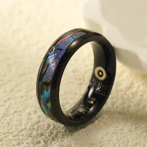 Anello smart con intarsio in conchiglia colorata, sensore salute e finitura nera testurizzata
