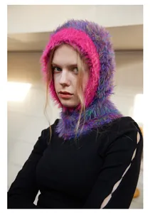 Detailed close-up of colorful faux mink fur balaclava with vibrant neon pink trim edge
