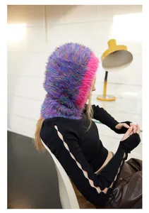 Side view of a fuzzy colorful gradient balaclava hood worn by a model in Y2K style