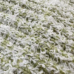 Damen Strickmütze aus Baumwollmischung mit grün-weißen Streifen und Bouclé-Struktur