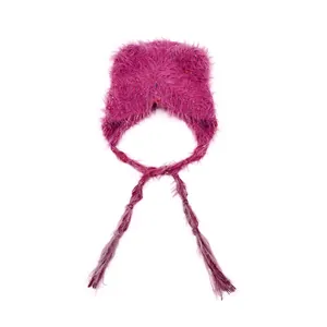 Vibrant rose red plush trapper hat with colorful flecks and long braided straps