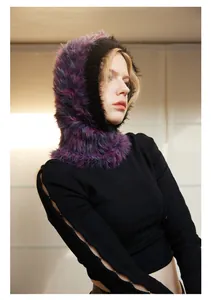 Close-up of colorful faux mink fur texture on a warm winter balaclava hood