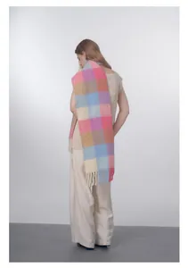 Detail of wool blend plaid scarf with macaron gradient colors and long tassels
