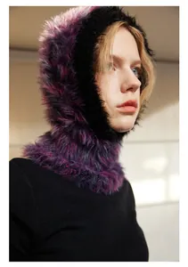 Close-up of plush purple and black winter balaclava hood showing soft faux fur texture