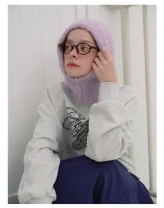 Chic purple knit balaclava hood featuring fluffy wool blend texture for winter warmth