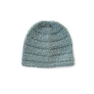 Minimalist light blue knit beanie with textured boucle wool blend for winter warmth