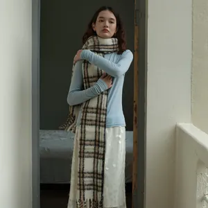 Plaid wool blend scarf with classic beige and green checks and elegant fringe detail