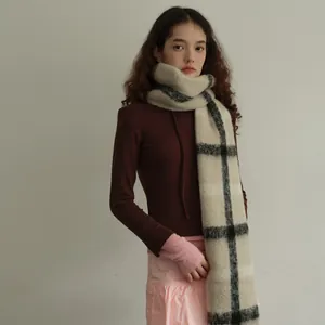 Classic oversized beige and charcoal plaid wool blend scarf with a soft brushed texture