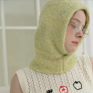 Light green wool blend knit balaclava hat with fuzzy texture for winter warmth