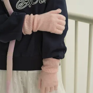 Pink wool blend knitted gloves with touchscreen function and matching striped scarf