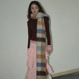 Vintage blue plaid wool blend scarf with fringe tassels for winter warmth and fashion