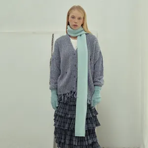Winter set with grey blue wool cardigan, mint green knit scarf and matching gloves