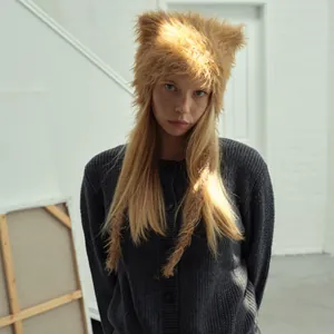 Cute brown plush cat ear beanie with pom-poms and warm ear flaps for women winter fashion