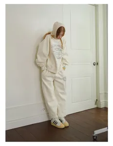 Detail shot of cream knitted balaclava wool blend hood for winter street style fashion