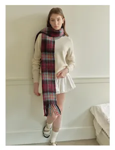 Cozy wool blend scarf with classic plaid pattern and colorful fringes for winter