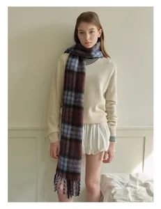 Classic British plaid wool blend scarf with long tassels and soft brushed texture