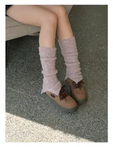 Detailed texture of lavender wool blend leg warmers styled with chunky platform shoes