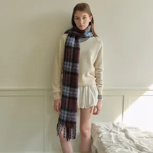 Classic British plaid wool blend scarf in blue and brown with soft fringe tassels
