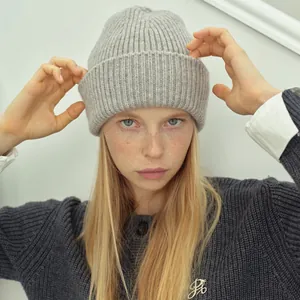 Classic grey ribbed wool beanie for women featuring a stylish thick knit texture