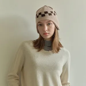 Chic checkerboard knit earflap beanie for women in beige and brown winter style