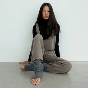 Grey wool blend knit leg warmers for women worn with minimalist loungewear outfit