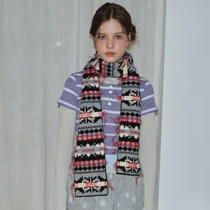 Fair Isle knit scarf with vintage geometric pattern and red fringe for winter fashion