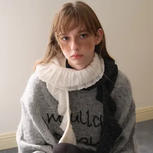 Women's grey knit sweater with black letter embroidery and ruffles wool blend scarf