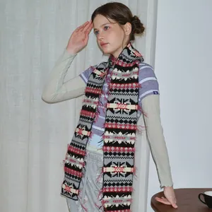 Fair Isle knit scarf with vintage geometric patterns in red and grey for winter warmth