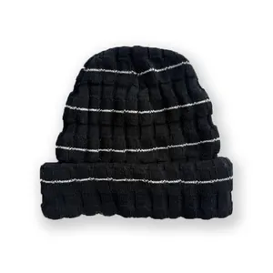 Striped waffle knit beanie in black and white with folded cuff for women winter fashion