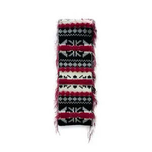 Thick Fair Isle knit scarf with vintage geometric patterns and red fringe accents