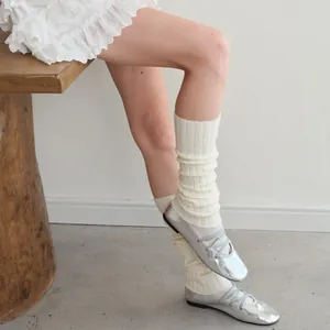 Chic ribbed wool blend leg warmers in cream white paired with silver ballet flats