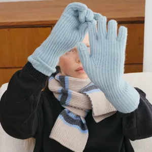 Light blue wool blend knit gloves for women with touchscreen compatibility and ribbed cuffs