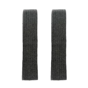 Minimalist dark grey wool blend knitted leg warmers in a vertical ribbed texture
