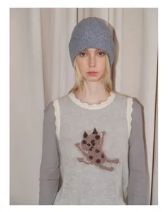 Detail of grey yak wool blend knitted beanie with soft texture for winter warmth