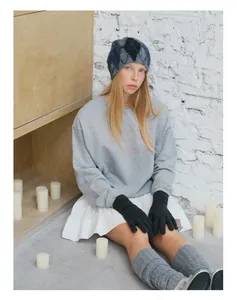 Detail of wool blend argyle knit beanie with matching sweatpants and gloves set
