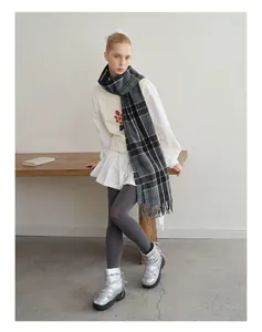 Classic grey checkered wool blend scarf styled with floral vest and pleated skirt