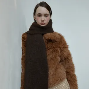 Brown faux fur jacket with dark coffee knit wool scarf for winter fashion style