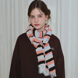 Striped wool blend knit scarf with tassels in pastel pink, blue, and cream blocks