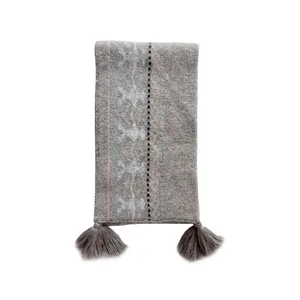 Fair Isle wool blend knit scarf in grey with snowflake patterns and fringe tassels