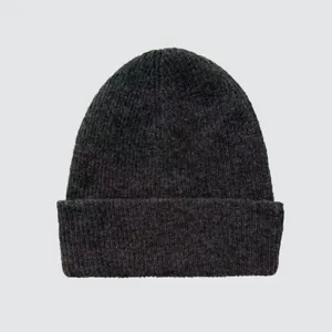 Dark grey yak cashmere blend knitted beanie with ribbed texture for winter warmth